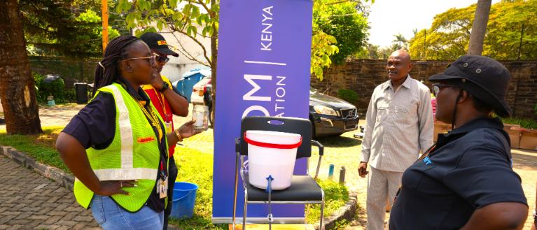 IOM and DHL employees