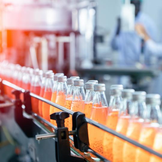 Orange juice bottled at factory
