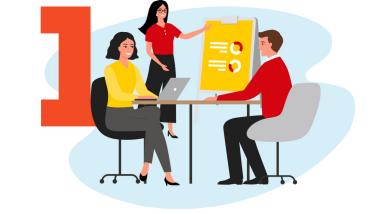 People talking in a meeting room with the number 1 behind.