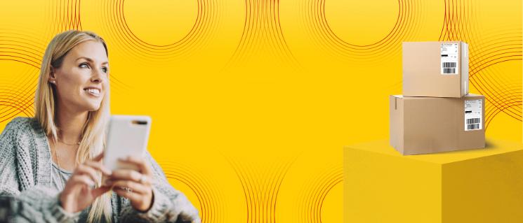 Young woman with cell phone in hand, looking at a stick of packages.